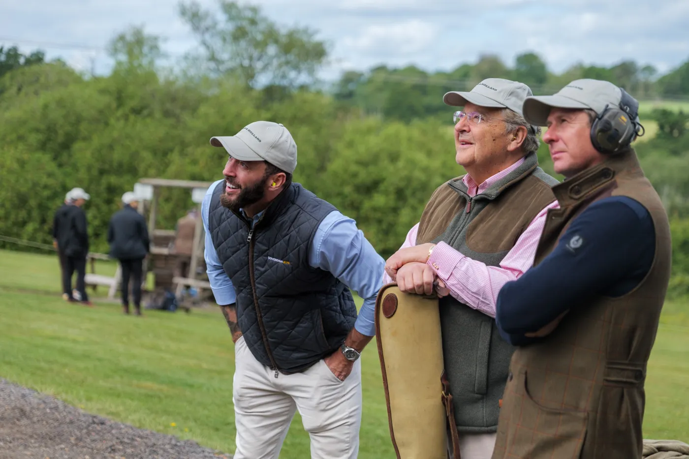 Three guests watching a clay, June 2026